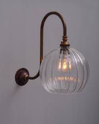 Hereford Ribbed Globe Swan Neck Wall Light With Images Wall Lights Brass Wall Light Wall Lights Living Room