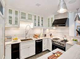 White Kitchen Cabinets And Black Appliances