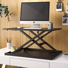 Single standing wood adjustable standing desk. Standing Desks That Ll Help Ease Work From Home Back Pain Popsugar Fitness