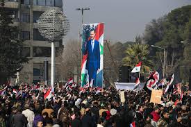The broadcaster also showed some loyalists dancing and waving the syrian flag, as well as photographs of assad displayed outside polling stations in various areas in damascus and sweida, in. His Country A Smoldering Ruin But Assad Still In His Seat The Times Of Israel