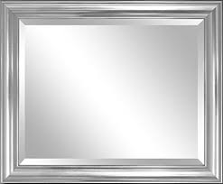 Silver beveled vanity mirror above an ivory washstand completed with a chrome faucet, a cream stone countertop nickel hardware on shaker cabinets. Silver Framed Bathroom Mirrors 1 Top Best Silver Framed Bathroom Mirrors
