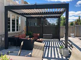 Aluminum Pergola Is A Very Functional Sunshade You Can Turn The Louvers To Any Angle That You Prefer Aluminum Pergola Backyard Patio Designs Louvered Pergola