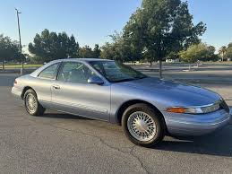 Image result for Dark Portofino Blue 1995 Town Car