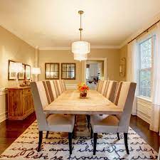 Without the rug, this dining room would completely white. Choosing The Best Rug For Your Dining Room Jabara S