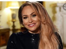 Darcy is starting to look like dick Tracy bless her heart