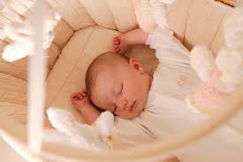 How To Put Baby Into A Crib Without Waking Her Up