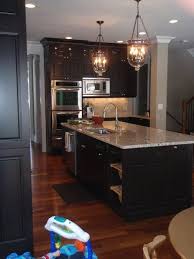 Cherry kitchen cabinets are one of the most widely used as they are easy to match with most room accents and have been showcased in many these dark kitchen cabinets work really well with any modern kitchen design and integrated seamlessly with granite kitchen countertops and tile flooring. Picasa Web Albums Mairin Gradek Kitchen Remodel Espresso Cabinets Home Kitchens