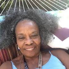 Passion fruit vine growing with multiple flowers