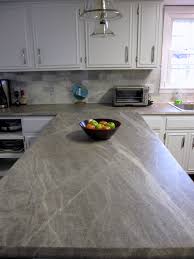 Best known as a counter top surfacing material, laminate is a durable decorative veneer applied to cabinetry, furniture, and other horizontal and vertical surfaces. Break It Down Now Our Kitchen Remodel Costs Scott And Allie Buy A House