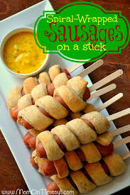 Spiral Wrapped Sausages On A Stick From Momontimeout Com Use Your Favorite Sausage Or Hot Dog And Make Up A Bunch Hot Dog Recipes Sausage On A Stick Food