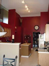 If you go this route, keep the other accents in the room fairly neutral to let the floor really stand out. Paint Stain Cabinets Decorating Help Red Kitchen Walls Kitchen Wall Colors Red Kitchen