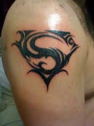 Pin By Grayson Bryant On Tattoo Superman Tattoos Hand Tattoos For Guys Flame Tattoos You will see me first draft out the superman logo, and then once i'm happy with it i then. tattoo superman tattoos