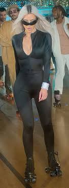 Kylie Jenner and Kim Kardashian slip into catsuits and roller-skates to  film opening scene