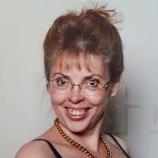 Please send photos of white ish kitchens with rattan style pendant lighting  over the island…