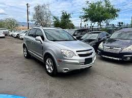 Image result for Silver Topaz 2013 Captiva