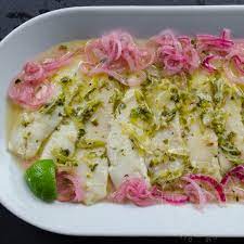 Place the fish and all marinade ingredients in a large bowl (or large freezer bag). Pescado Con Vino Fish With White Wine