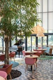 Boutique Coffee Roaster Coperaco S First Cafe Holds A Modern Tree House Cafe House Cafe Interior Design Modern Tree House