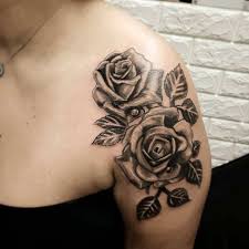 A dark rose that sits firmly on top of the shoulder. Top 51 Best Rose Shoulder Tattoo Ideas 2021 Inspiration Guide