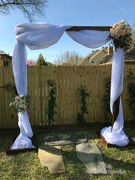 Wedding arches with flowers for rent. Wood Wedding Arch Rental Installation