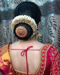 Glam Look For My Bride Harivadhana Those Sharp Eyes Flawless Base For Her Muhurtham Ma Indian Wedding Hairstyles Indian Bride Hairstyle Bridal Hair Buns