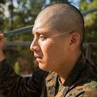 Staff Sgt. Joshua Stanton stands at ease while leading