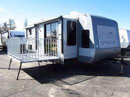 These toy haulers come loaded ! Unlike Anything Else 2015 Journeyer 340flr Patio Deck Travel Trailer By Open Range Rv Youtube