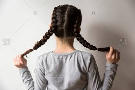 If you're someone who doesn't like pulling your hair completely back, then this is a great style for. Braided Pigtails Stock Photos Offset