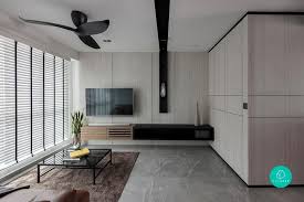 Luxurious white entrance hall with golden accents leads to a floating marble staircase with geometric patterned handrail in the modern islamic home. Hdb Edgeprop Sg