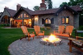 These pavers come in a range of modern patio designs often incorporate dramatic contrasts such as the color difference between the above patio and the house's exterior. 25 Great Patio Paver Design Ideas