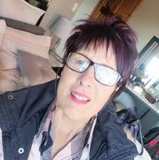 How can I get rid of green hairy algae in my marine aquarium?