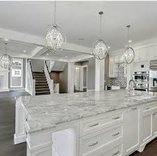 Instead making use of ceramic tiles as some sort of back splash, you will want to utilize mirrored floor tiles? Top 15 Best Materials For Kitchen Countertops 2021 White Kitchen Remodeling Home Decor Kitchen Kitchen Inspirations