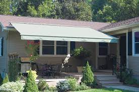 Our Awning Or Pergola System Provides Shade To Your Deck Or Patio Your Home Stays Cooler Too Awning Installation Retractable Awning Residential Awnings