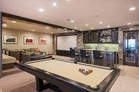 This wine table has hooks for your wine glasses. Great Game Room With Carpet High Ceiling In Park City Ut Home Theater Rooms Basement Home Home Theater Seating
