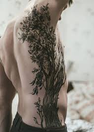 Side and rib tattoos cost almost the same; 76 Elegant Tree Tattoos On Rib