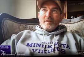 Vikings coaches Mike and Adam Zimmer putting heads together