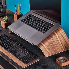 Executive desk with wireless charging and hidden drawer. The Best Laptop Stands For A More Comfortable Home Office
