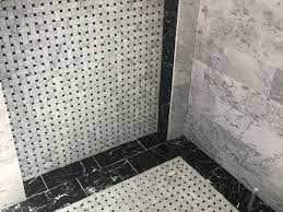 I was convinced that they used the wrong grout color, so our builder came over to have a look at it himself. Color Grout For Carrara Basketweave Black Walls Marble