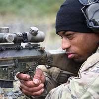 U.S. army Sgt. Joshua Strauss, center, with the 3rd