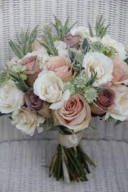 Blush pink wedding gowns are also big news in recent months, particularly dresses with flower embroidery! Must Have This Elegant And Soft Blush Dusty Rose And White Flowers Bridal Bouquets With Greenery Outd Diy Wedding Bouquet Wedding Flowers Antique Rose Bouquet