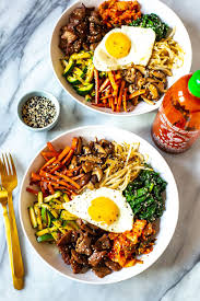 This 30 Minute Korean Bibimbap Recipe Is A Mix Of Sesame Fried Vegetables Minced Beef Kimchi Served Wit Bibimbap Recipe Asian Vegetables Korean Lamb Recipe