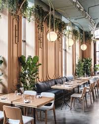 Wood Walls With Circular Trim Lots Of Plants Big Bulb Lighting In 2020 Restaurant Interior Design Cafe Interior Design Restaurant Decor