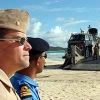Marine 2nd Lt. David Palacio from Bedford, Texas, assigned to the 15th  Marine Expeditionary Unit (MEU) practice fast roping aboard USS Boxer (LHD  4).