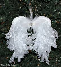 These homemade angel ornaments are fun and easy to make and they look adorable hanging on the christmas tree. Diy Angelic Organdy Ribbon Angel Wings Christmas Angel Ornaments Christmas Angels Angel Wing Ornaments