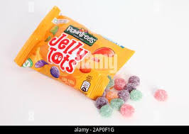 Rowntrees Jelly Tots 2020, open bag with sweets pouring out Stock Photo -  Alamy
