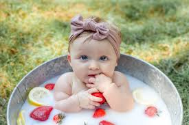 Fill a tub with lukewarm water as you normally would add enough milk to make the water cloudy. Tips For A Baby Milk Bath Photoshoot Coffee With Summer