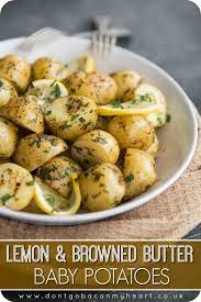 These Boiled Baby Potatoes Are Served With A Browned Butter Sauce And Infused With Lemon The Perfect Quick And Easy Side Recipes Boiled Baby Potatoes Cooking