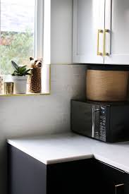 Black And Gold Kitchen Tiles The Reveal Of Our Black White And Gold Kitchen Swoon Worthy Farmhouse Kitchen Remodel Kitchen Remodel Checklist Simple Kitchen Remodel