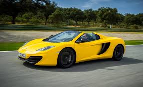 2013 Mclaren Mp4 12c Spider First Drive Review Roadandtrack Com The family travel through the desert of abu dhabi before finally parking their cars outside etihad towers. 2013 mclaren mp4 12c spider first drive