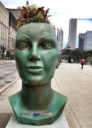 Public Art: Creepy Giant Planter Heads Promote An Eco-Friendly Chicago