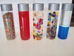 So if you have a little one in your life who also likes to shake, rattle, and second, i learned that glitter + colored water makes for a pretty magical combination, without anything else (e.g., baby oil, corn syrup, etc) added to the water. Oil Water Sensory Bottles The Baby Vine